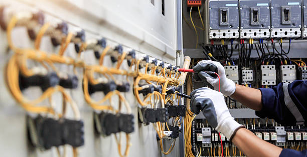 Professional Electrician technician working in Maryland Heights, MO